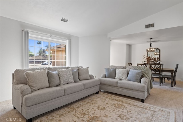 7009 Etter St, Bakersfield, CA 93308 - living room featuring light carpet and a chandelier