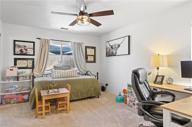 7009 Etter St, Bakersfield, CA 93308 - bedroom featuring a desk, light carpet, and a ceiling fan