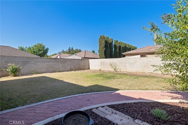 7009 Etter St, Bakersfield, CA 93308 - fenced backyard with a patio