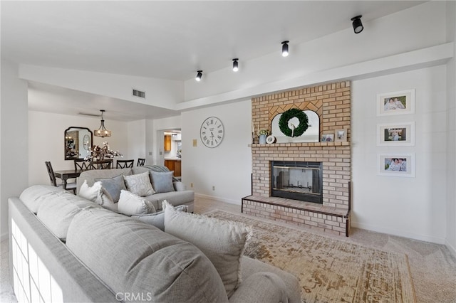7009 Etter St, Bakersfield, CA 93308 - carpeted living area with lofted ceiling and a fireplace