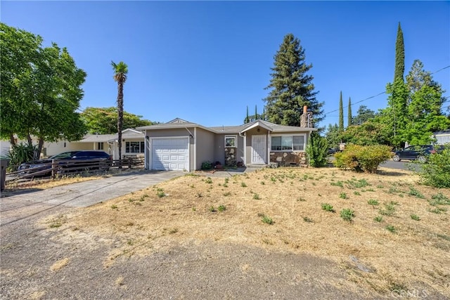 13169 Third St, Clearlake Oaks, CA 95423 - single story home featuring an attached garage, driveway, and stucco siding