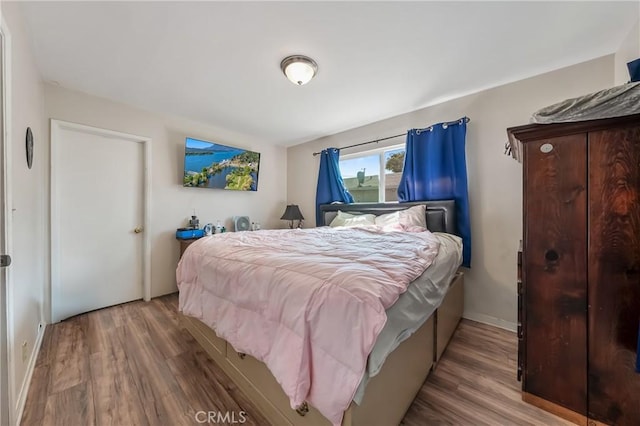 13169 Third St, Clearlake Oaks, CA 95423 - bedroom with wood finished floors and baseboards