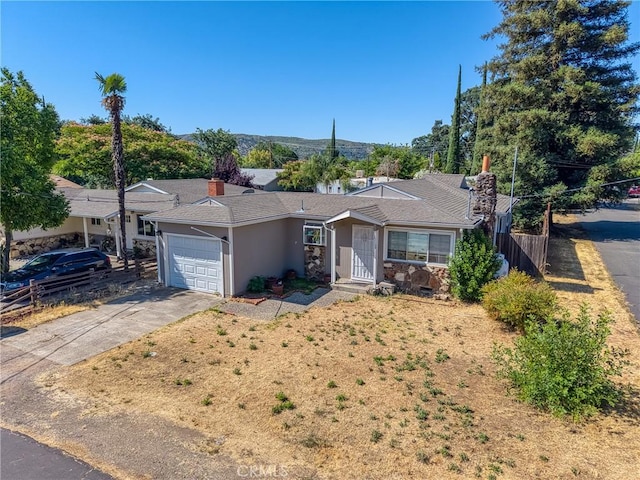 13169 Third St, Clearlake Oaks, CA 95423 - single story home featuring a garage, stucco siding, and concrete driveway