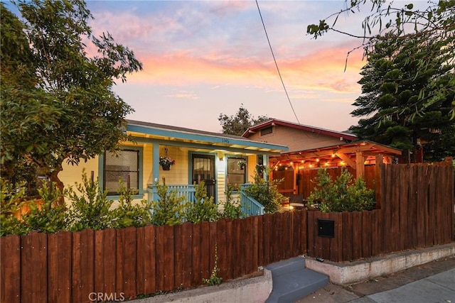 1146 N Loma Vista Dr, Long Beach, CA 90813 - bungalow featuring covered porch and a fenced front yard
