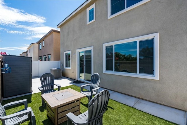 31844 Gimbal Way, Winchester, CA 92596 - back of property featuring stucco siding and a patio