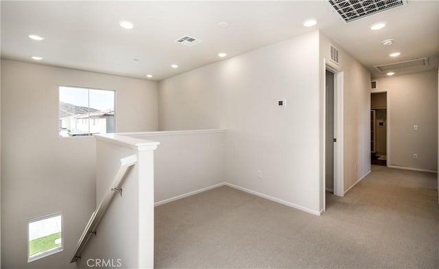 31844 Gimbal Way, Winchester, CA 92596 - corridor with an upstairs landing, light carpet, and recessed lighting