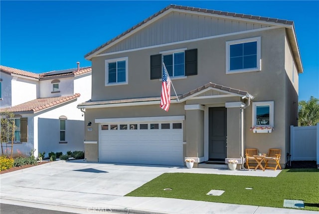 31844 Gimbal Way, Winchester, CA 92596 - view of front facade with a tile roof, a garage, stucco siding, and driveway