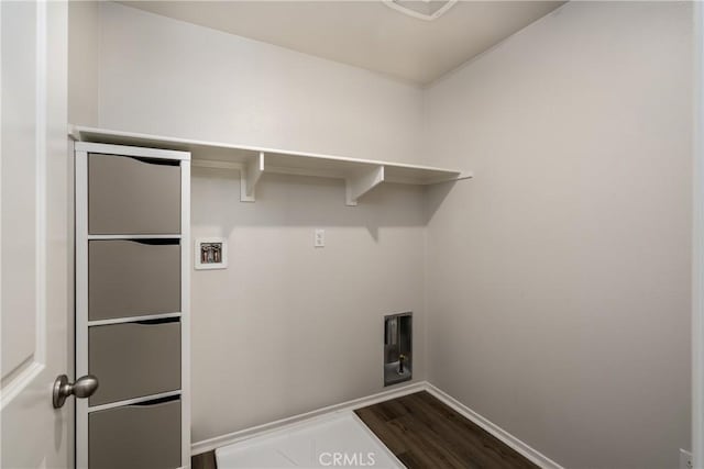 31844 Gimbal Way, Winchester, CA 92596 - laundry area featuring washer hookup and dark wood-style flooring
