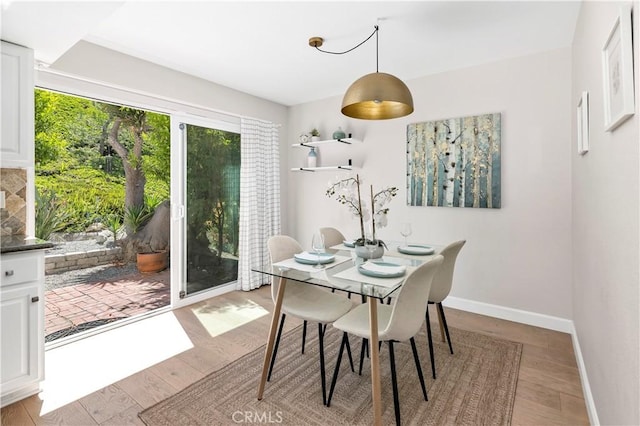 881 Calle Pluma, San Clemente, CA 92673 - dining space with light wood-style floors and baseboards