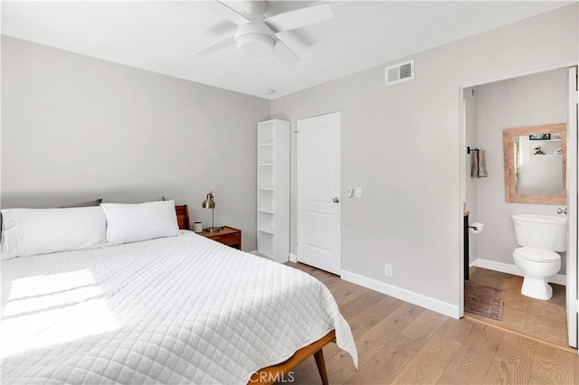 881 Calle Pluma, San Clemente, CA 92673 - bedroom featuring light wood finished floors, ensuite bathroom, a ceiling fan, and a spacious closet