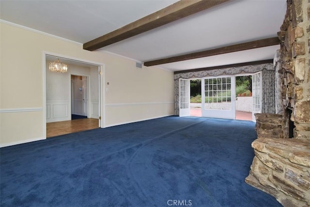4312 Noble Ave, Sherman Oaks, CA 91403 - unfurnished living room featuring carpet, a chandelier, beam ceiling, and a wainscoted wall