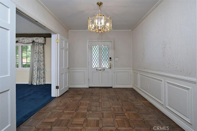 4312 Noble Ave, Sherman Oaks, CA 91403 - foyer entrance with a chandelier, crown molding, a wainscoted wall, and a decorative wall