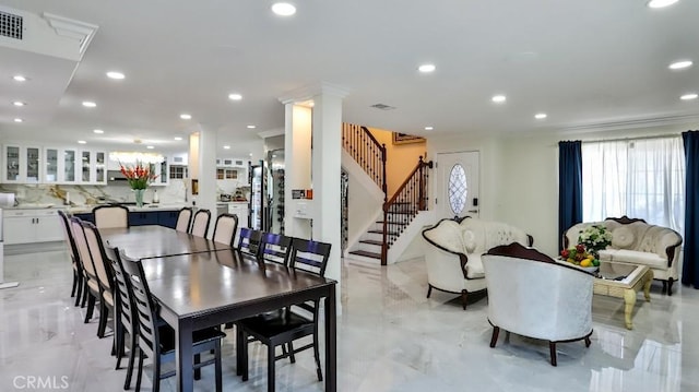 17230 San Lorenzo Cir, Fountain Valley, CA 92708 - dining space featuring crown molding, recessed lighting, light marble finish floors, and stairway