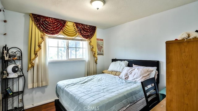 17230 San Lorenzo Cir, Fountain Valley, CA 92708 - bedroom featuring dark wood-style floors and baseboards