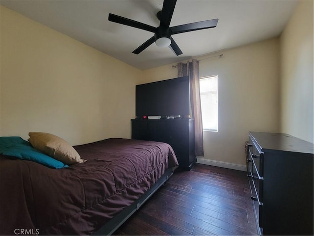 4434 Crocker St, Los Angeles, CA 90011 - bedroom with dark wood-type flooring and a ceiling fan