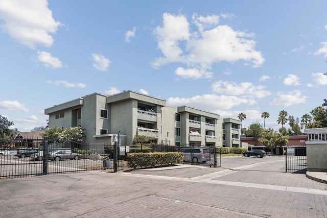 1040 E Washington Ave Unit 31, Escondido, CA 92025 - view of property featuring uncovered parking