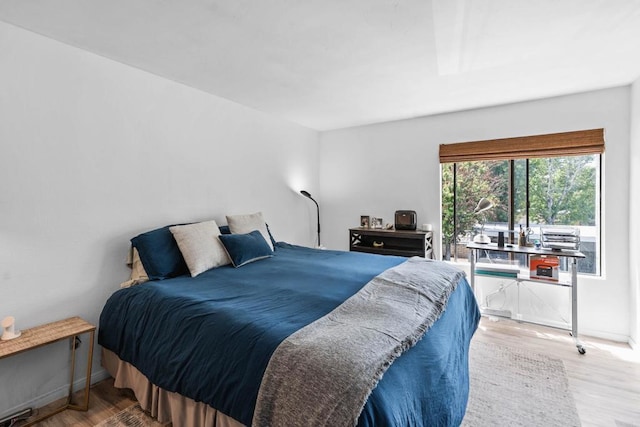 1040 E Washington Ave Unit 31, Escondido, CA 92025 - bedroom with wood finished floors and baseboards