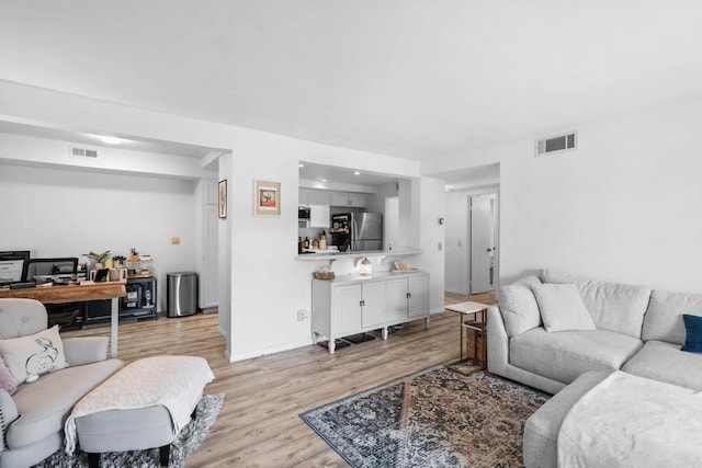 1040 E Washington Ave Unit 31, Escondido, CA 92025 - living area with light wood finished floors and baseboards
