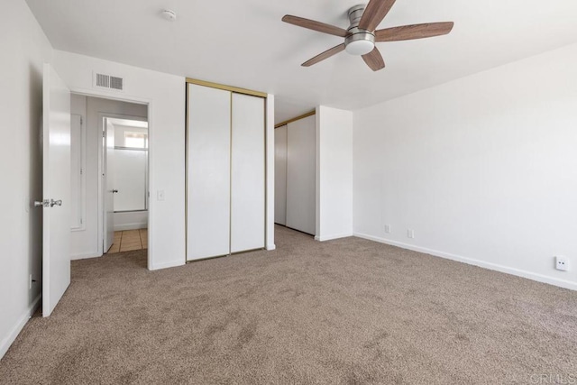 3670 Forest Glen Rd, San Diego, CA 92154 - unfurnished bedroom featuring carpet, two closets, and ceiling fan