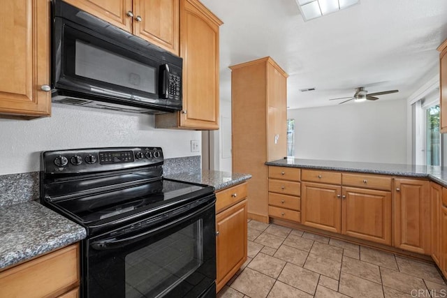 3670 Forest Glen Rd, San Diego, CA 92154 - kitchen featuring black appliances, a ceiling fan, and dark stone countertops