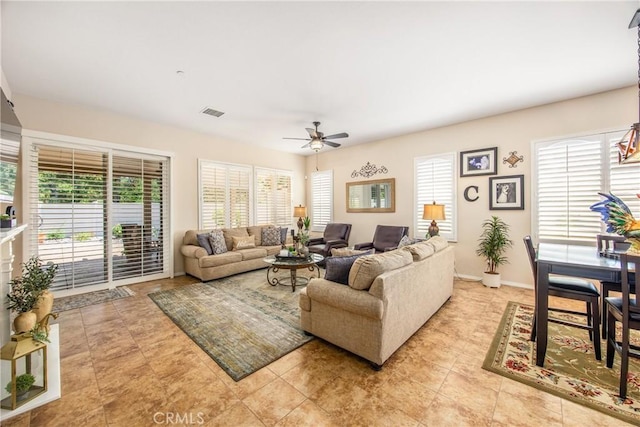 1506 Pierce Ml, Beaumont, CA 92223 - living room with ceiling fan and light tile patterned flooring