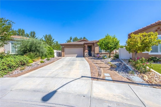 1506 Pierce Ml, Beaumont, CA 92223 - view of front of house with stucco siding, an attached garage, driveway, and a tiled roof