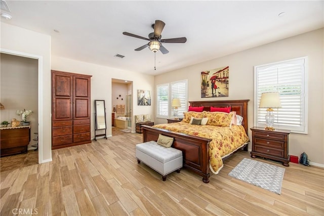 1506 Pierce Ml, Beaumont, CA 92223 - bedroom featuring light wood-type flooring, ensuite bath, and a ceiling fan