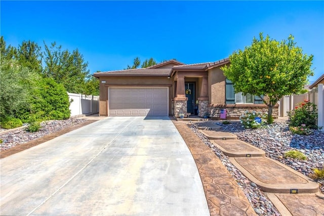 1506 Pierce Ml, Beaumont, CA 92223 - view of front facade featuring an attached garage, concrete driveway, stucco siding, stone siding, and a tiled roof