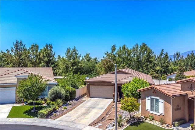 1506 Pierce Ml, Beaumont, CA 92223 - view of front of home featuring a tiled roof, stucco siding, and driveway