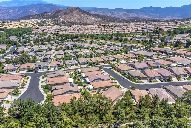 1506 Pierce Ml, Beaumont, CA 92223 - aerial overview of property's location with a mountain backdrop and nearby suburban area