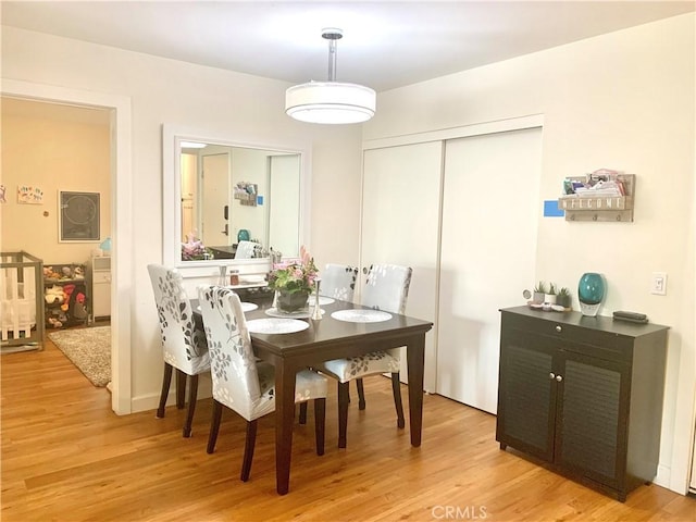 5800 Owensmouth Ave Unit 77, Woodland Hills, CA 91367 - dining area with light wood-style flooring