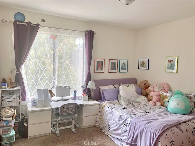 5800 Owensmouth Ave Unit 77, Woodland Hills, CA 91367 - bedroom with light carpet, multiple windows, and an office area
