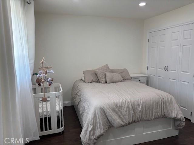 8596 Camelia Dr, Riverside, CA 92504 - bedroom featuring recessed lighting, a closet, and dark wood-style floors