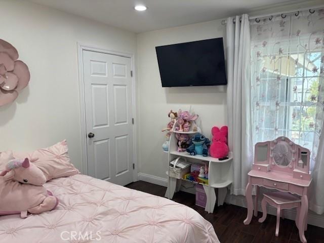 8596 Camelia Dr, Riverside, CA 92504 - bedroom with dark wood finished floors and recessed lighting