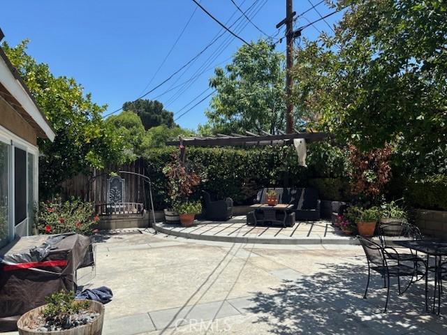 8596 Camelia Dr, Riverside, CA 92504 - view of patio / terrace with an outdoor hangout area