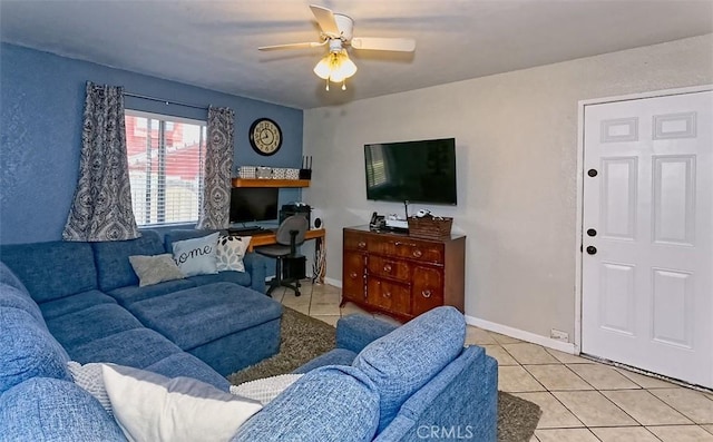 12164 Galaxy St, Victorville, CA 92392 - living area with light tile patterned flooring, a ceiling fan, and a desk