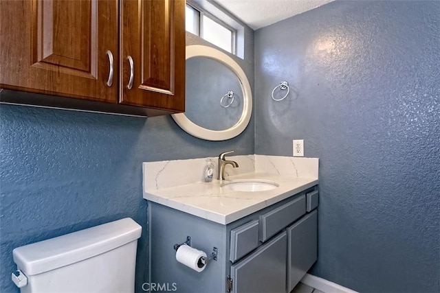 12164 Galaxy St, Victorville, CA 92392 - half bathroom with vanity and a textured wall