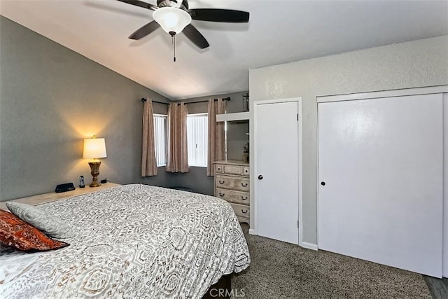 12164 Galaxy St, Victorville, CA 92392 - bedroom with vaulted ceiling, dark colored carpet, and a ceiling fan