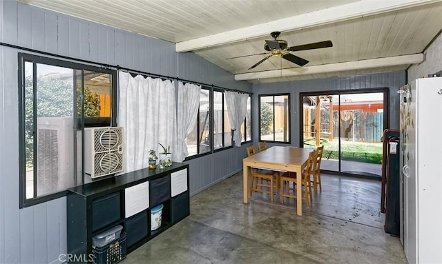 12164 Galaxy St, Victorville, CA 92392 - sunroom with concrete flooring, ceiling fan, outdoor dining space, and wooden walls