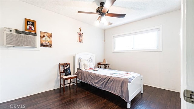 480 W D St, Colton, CA 92324 - bedroom featuring hardwood / wood-style floors, a wall unit AC, a textured ceiling, and a ceiling fan