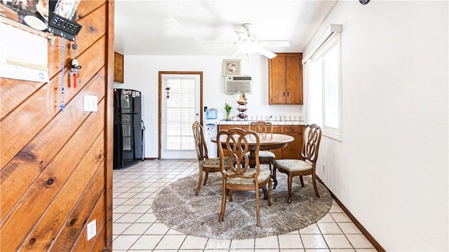 480 W D St, Colton, CA 92324 - dining space with light tile patterned floors, a wall mounted air conditioner, and a ceiling fan