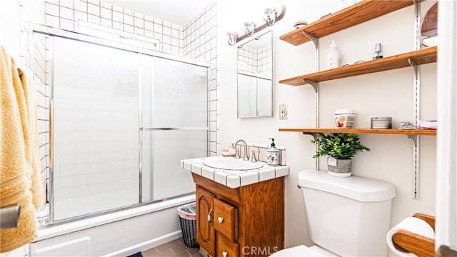 480 W D St, Colton, CA 92324 - full bathroom with vanity, enclosed tub / shower combo, and tile patterned flooring