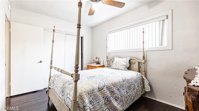 480 W D St, Colton, CA 92324 - bedroom featuring multiple windows, dark wood-style flooring, a closet, and a ceiling fan