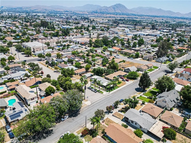 480 W D St, Colton, CA 92324 - aerial view of property and surrounding area with a mountain backdrop and nearby suburban area