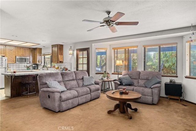 625 La Bonita Ct, Chico, CA 95973 - living room with plenty of natural light and light colored carpet