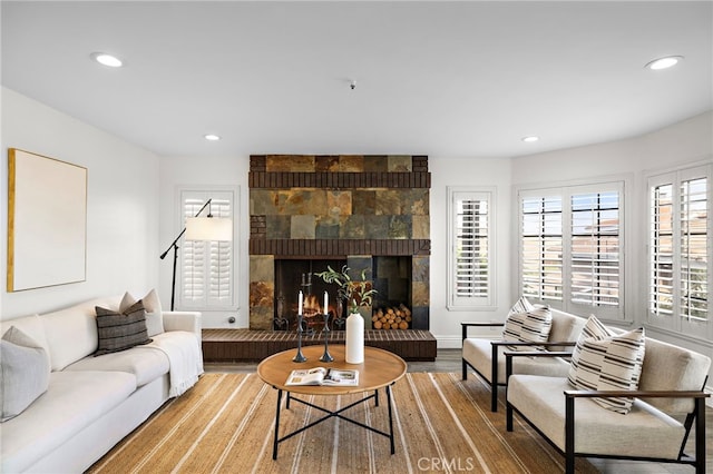 609 Calle Reata, San Clemente, CA 92673 - living room with wood finished floors, recessed lighting, and a fireplace