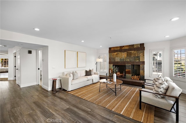 609 Calle Reata, San Clemente, CA 92673 - living room with wood finished floors, recessed lighting, and a tile fireplace
