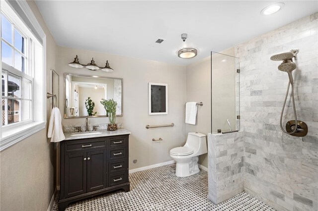 609 Calle Reata, San Clemente, CA 92673 - bathroom with vanity, a walk in shower, and healthy amount of natural light