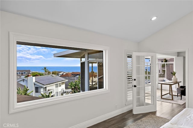 609 Calle Reata, San Clemente, CA 92673 - bedroom featuring wood finished floors, multiple windows, lofted ceiling, a water view, and recessed lighting