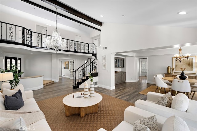 609 Calle Reata, San Clemente, CA 92673 - living room with a chandelier, stairs, high vaulted ceiling, wood finished floors, and beamed ceiling